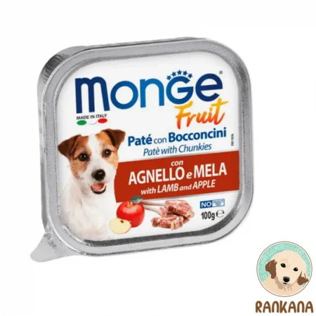 Tina de comida húmeda para perros Monge Fruit con sabor a cordero y manzana, formato de 100 gramos. La etiqueta muestra la imagen de un perro Jack Russell, manzanas rojas y cortes de cordero, con el texto "MONGE Fruit" y "Paté with LAMB and APPLE".