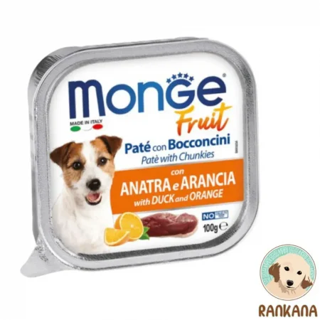 Tina de comida húmeda para perros Monge Fruit con sabor a pato y naranja, formato de 100 gramos. La etiqueta muestra la imagen de un perro Jack Russell, naranjas cortadas y carne de pato cruda, con el texto "MONGE Fruit" y "Paté with DUCK and ORANGE".